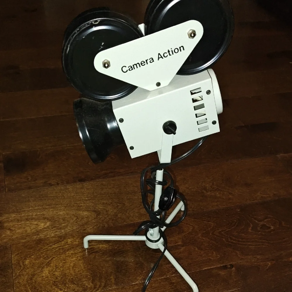 White and Black Camera Action Tripod From 1989